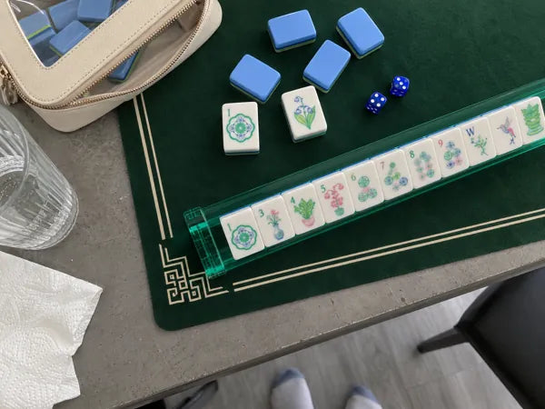 Mahjong set photographed at the table, accompanying review 5