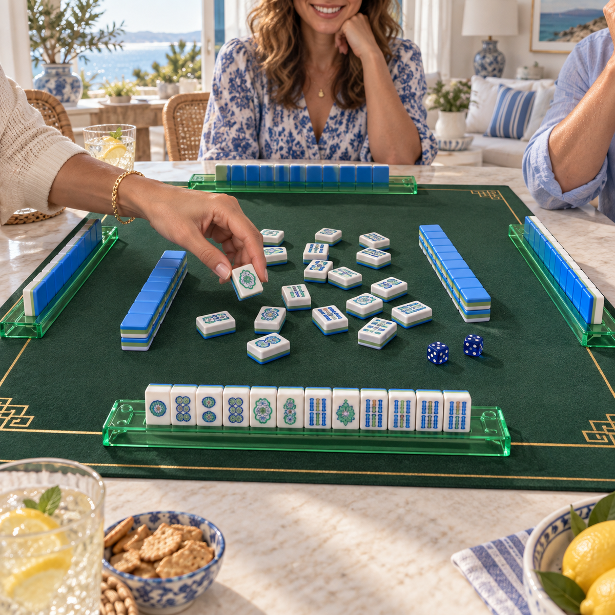 Blue Hour mahjong tiles in a styled game setting with a green mat, green racks and blue dice