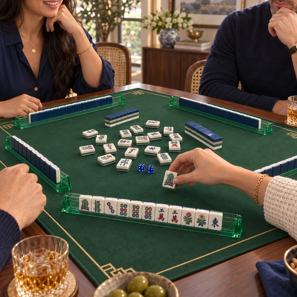 Midnight Mahj mahjong tiles in a styled game setting with a green mat, green racks and blue dice