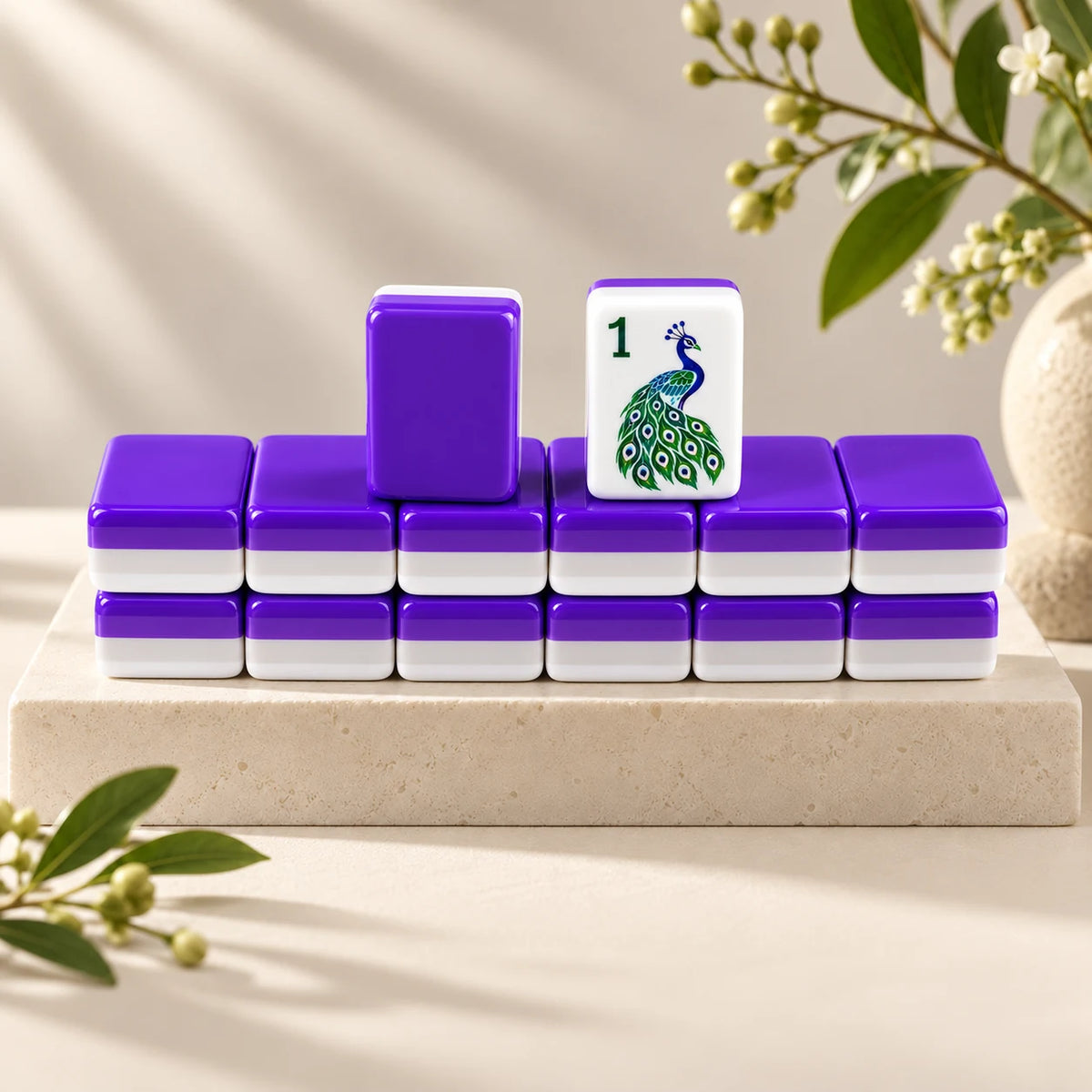 Plume — tile backs and face arranged on a stone plinth