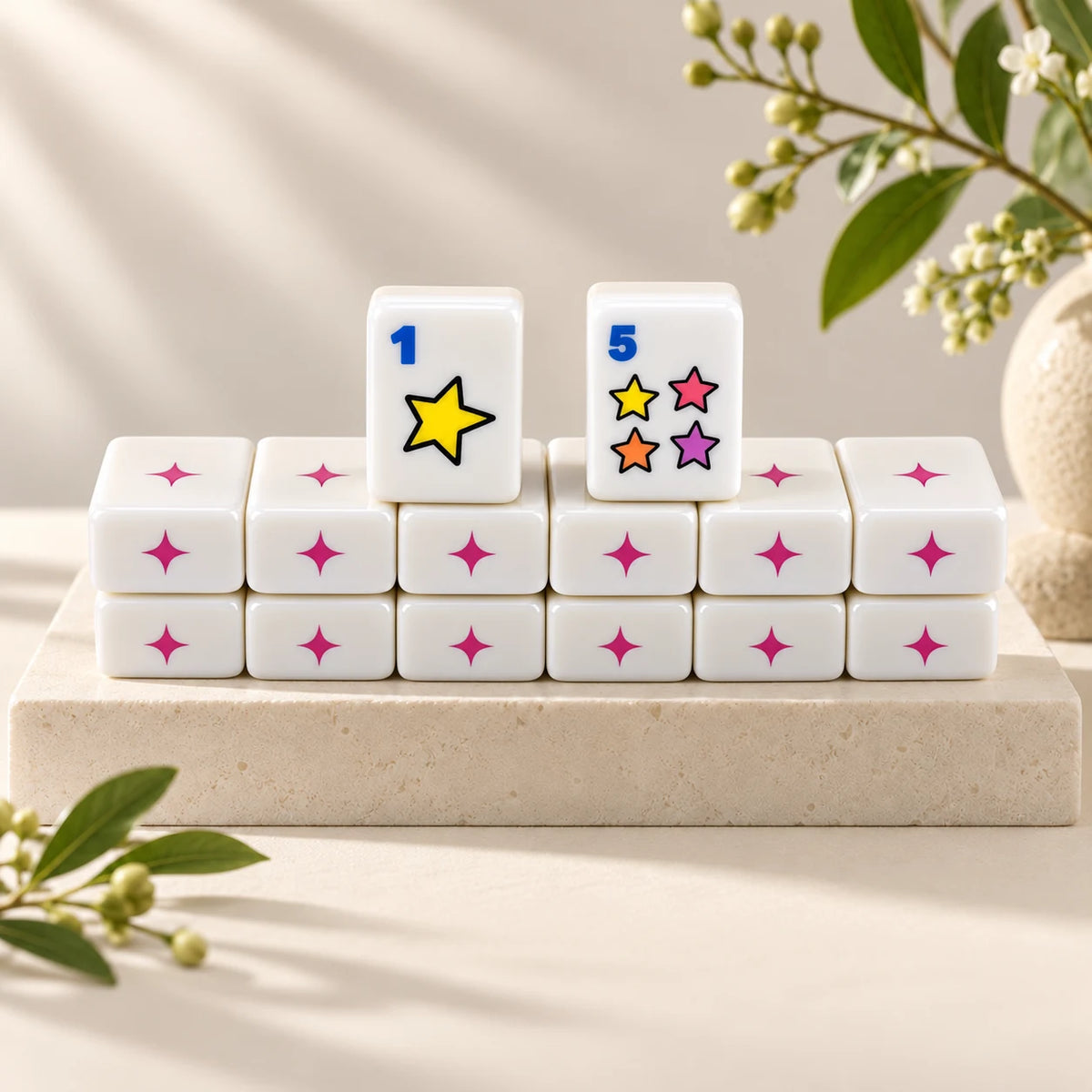 Pop Club — tile backs and face arranged on a stone plinth