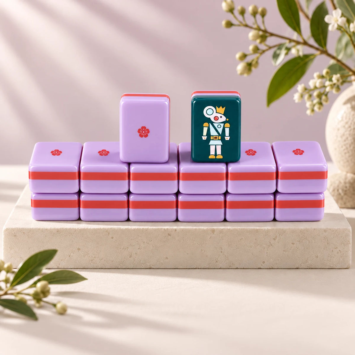Sugarplum — tile backs and face arranged on a stone plinth