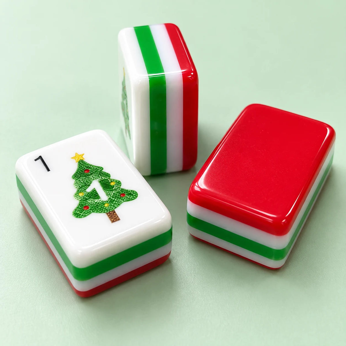 Merry Mahjong American mahjong tile, close view of the finish and red reverse with green-and-white layers