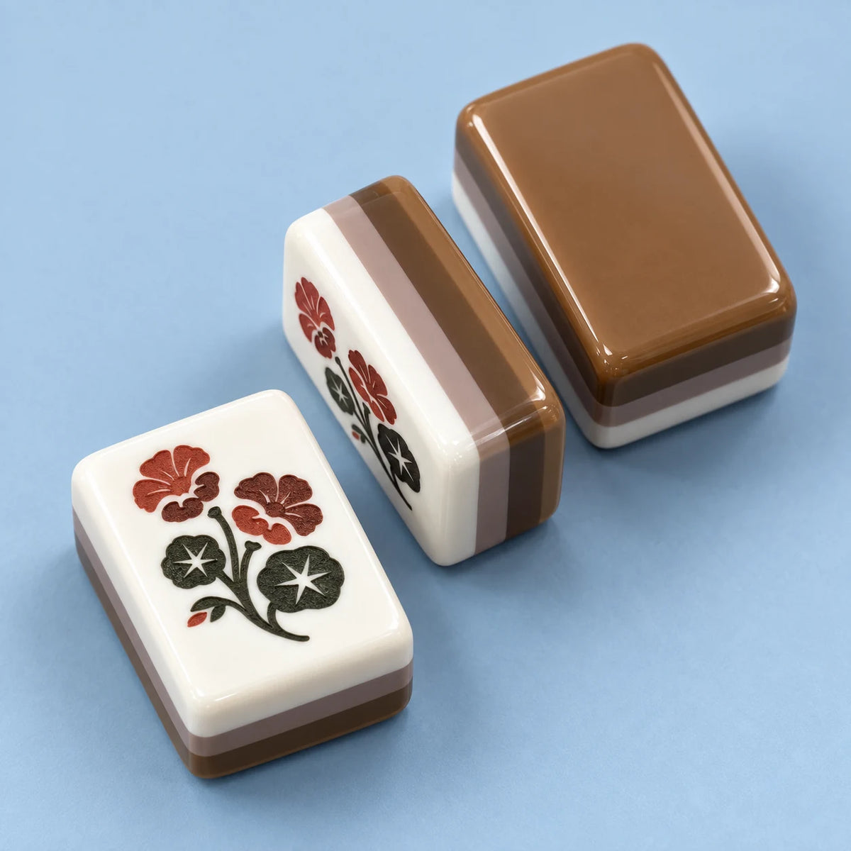 Mocha Social American mahjong tile, close view of the finish and caramel reverse with brown and taupe layers