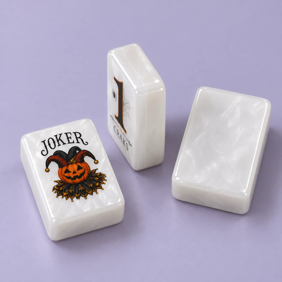 Moonlit Manor American mahjong tile, close view of the finish and plain pearlescent white tile reverse