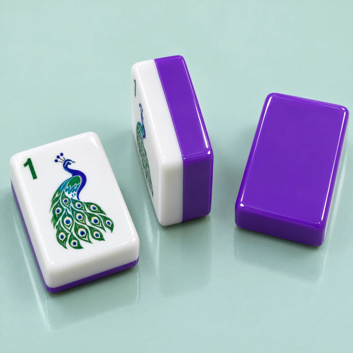 Plume American mahjong tile, close view of the finish and solid purple tile reverse