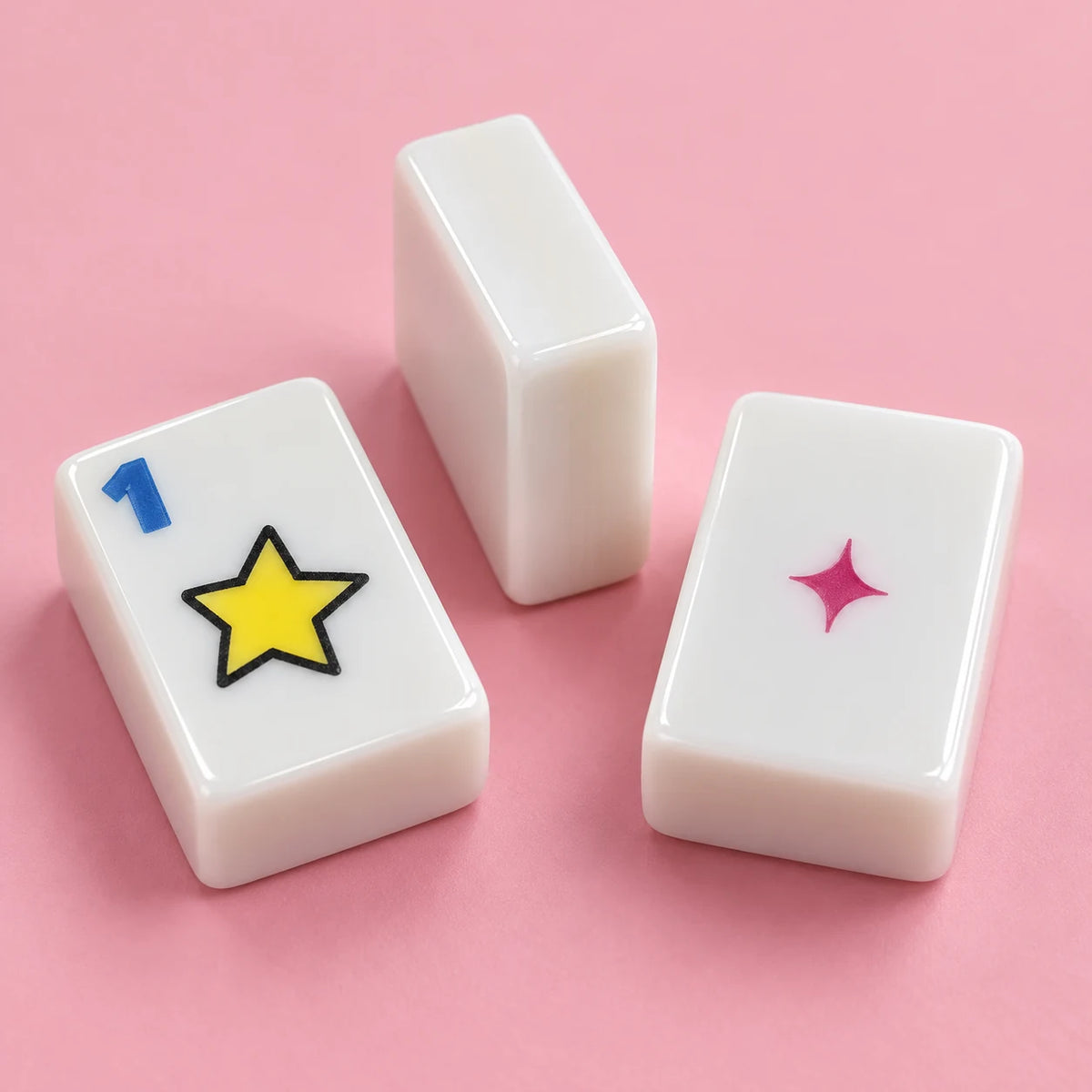 Pop Club American mahjong tile, close view of the finish and white reverse with a small magenta star