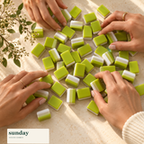 Appletini apple green american mahjong tiles — hands with tiles