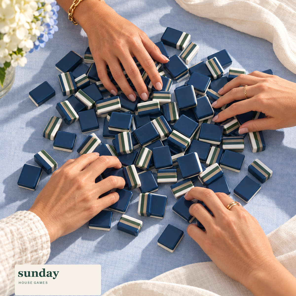 Midnight Mahj navy american mahjong tiles — hands with tiles