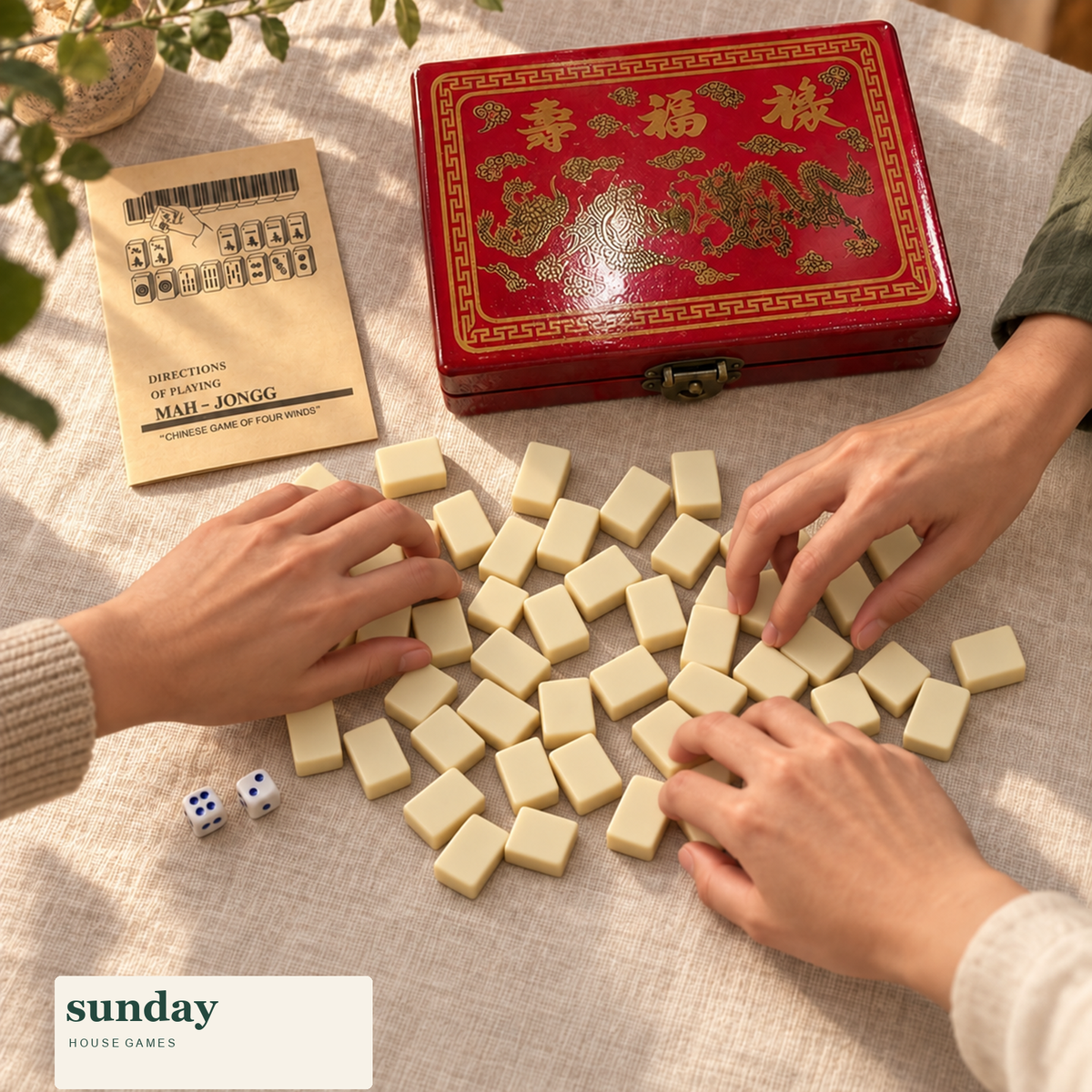 Reunion chinese mahjong set with case — hands with tiles