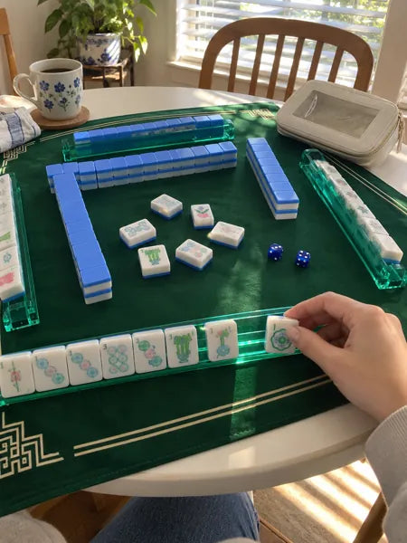 Mahjong set photographed at the table, accompanying review 4